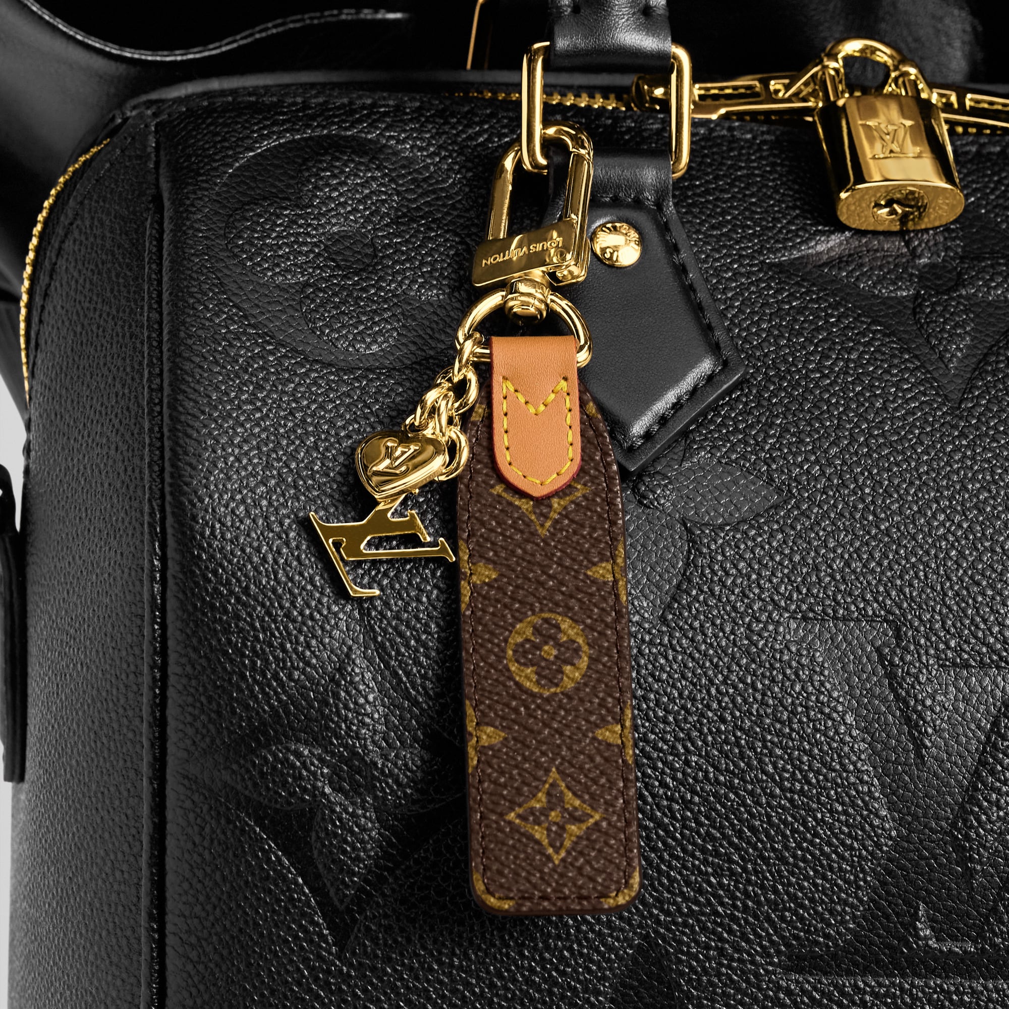LV Cherished Tab Key Holder . in Women