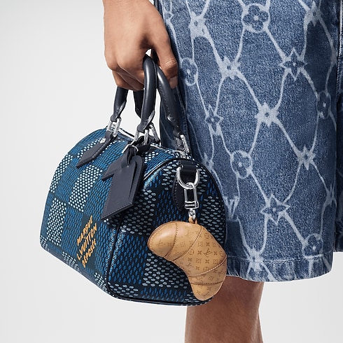 LV Croissant Bag Charm . in Men's Accessories Key Holders and Bag Charms collections by Louis Vuitton (Product zoom)