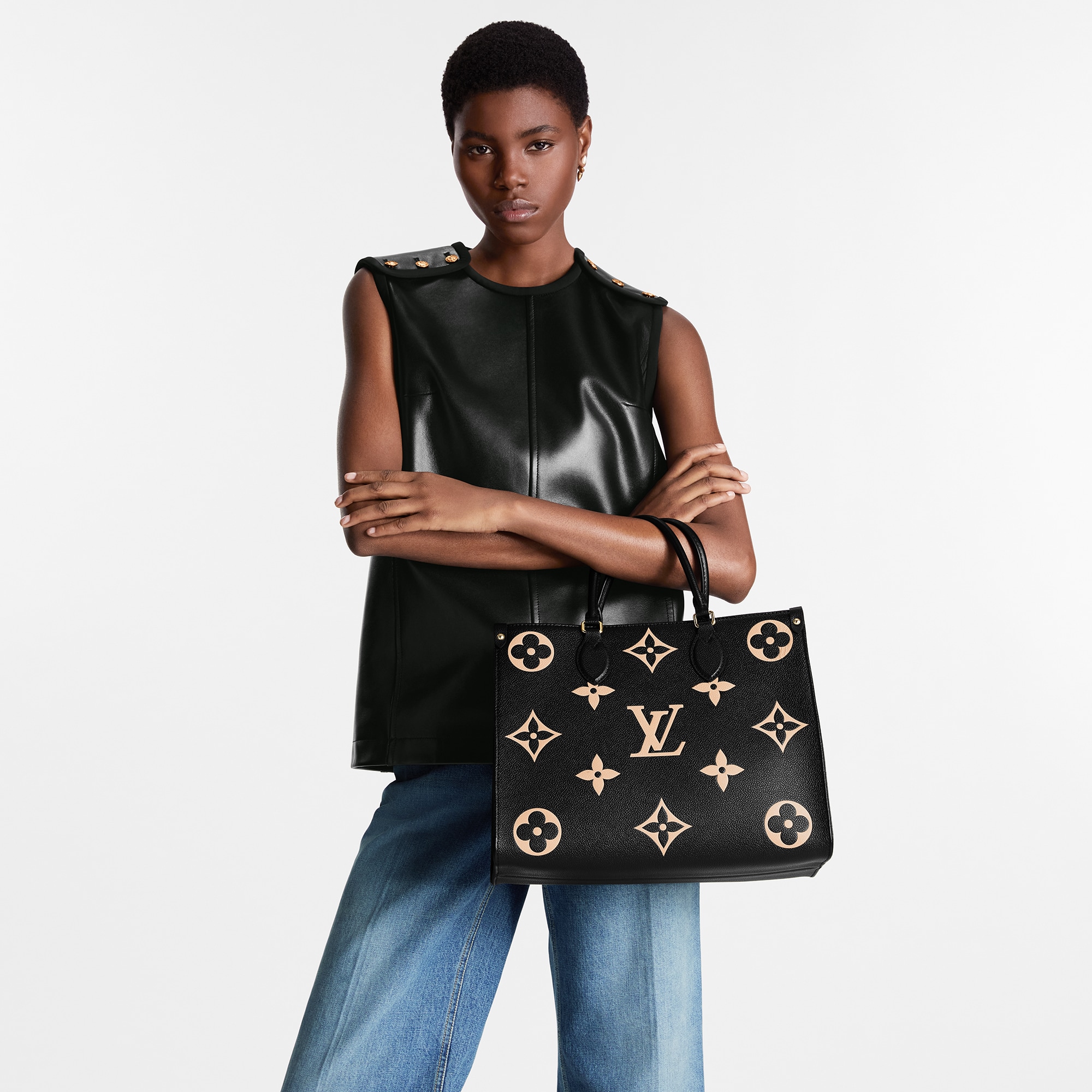 Onthego MM Bicolour Monogram Empreinte Leather in Women