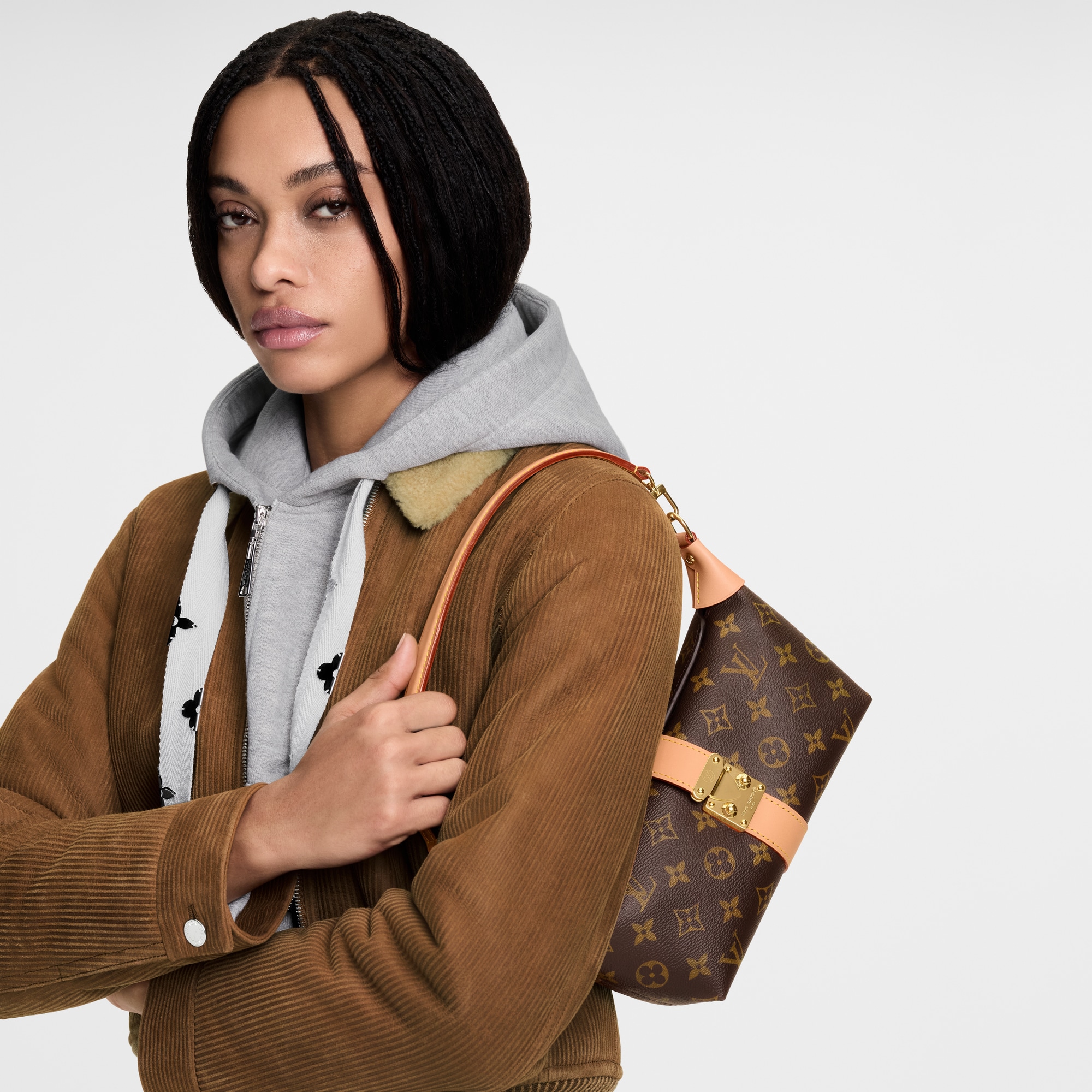 Pochette Mia Monogram in Women