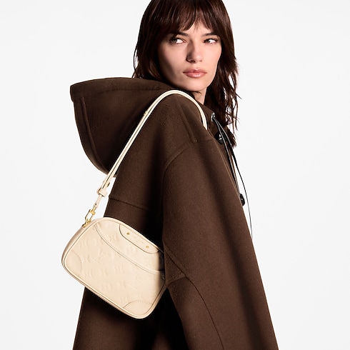 Tiny Camera Bag Monogram Empreinte Leather in Women's Wallets and Small Leather Goods Wallets on Chain and Micro Bags collections by Louis Vuitton (Product zoom)